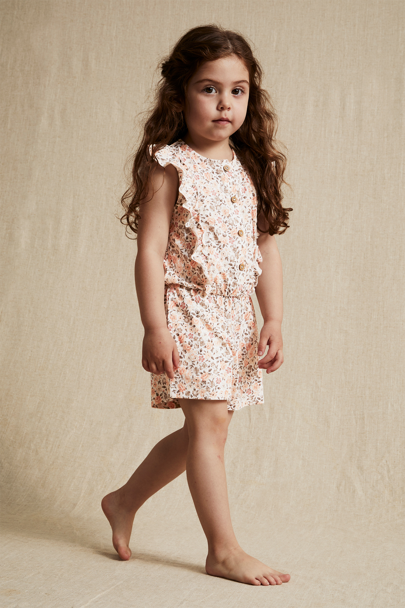 Blommig jumpsuit med volanger